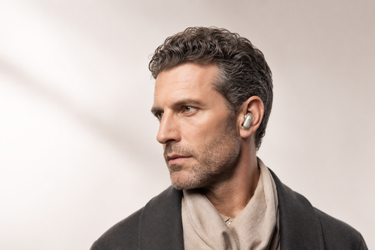 Man wearing Liberty 5 Pro Max Noise Cancelling Earbuds