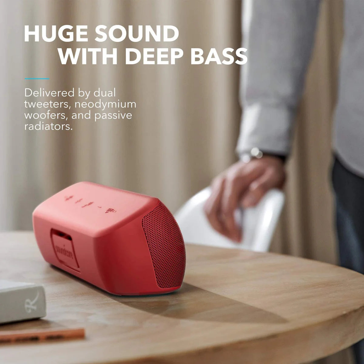 soundcore red speaker with deep bass for immersive sound