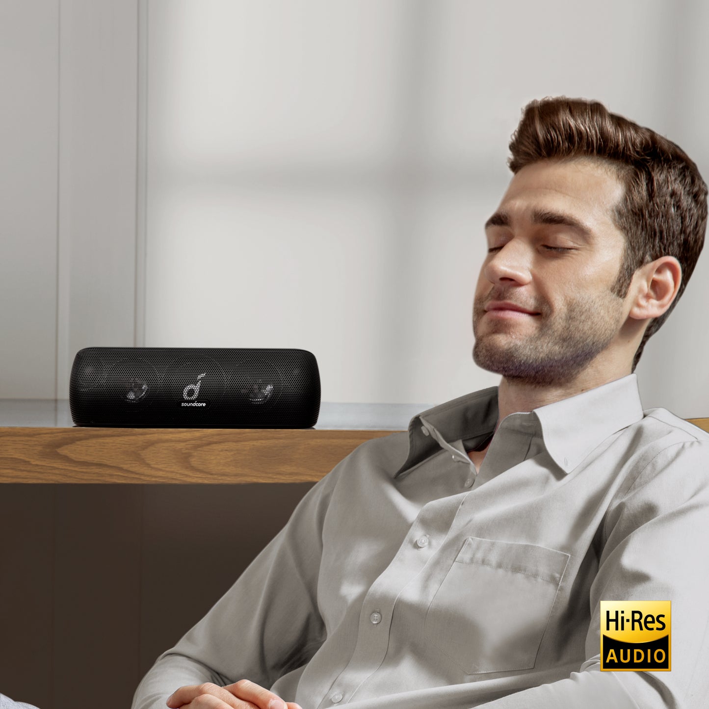 soundcore speaker for Hi-Res AUDIO with man relaxing