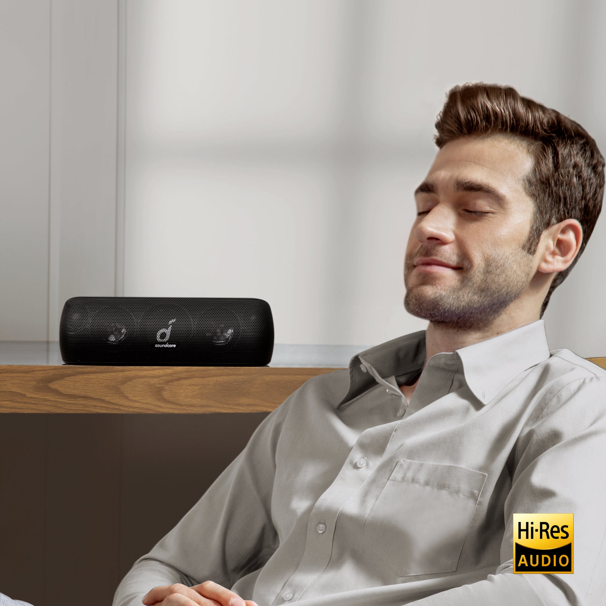 soundcore speaker for Hi-Res AUDIO with man relaxing