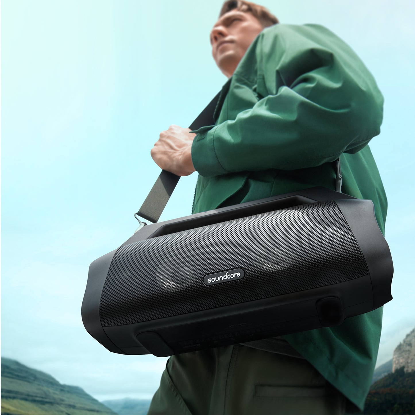soundcore speaker with carrying strap for outdoor adventure