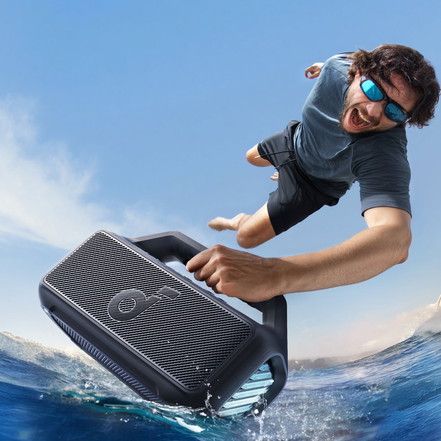 soundcore waterproof speaker with man jumping over water