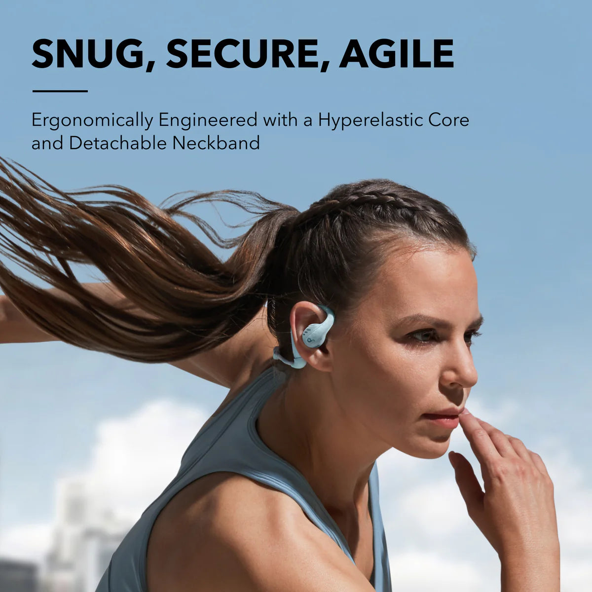 Woman running with soundcore open-ear earbuds for ergonomic fit