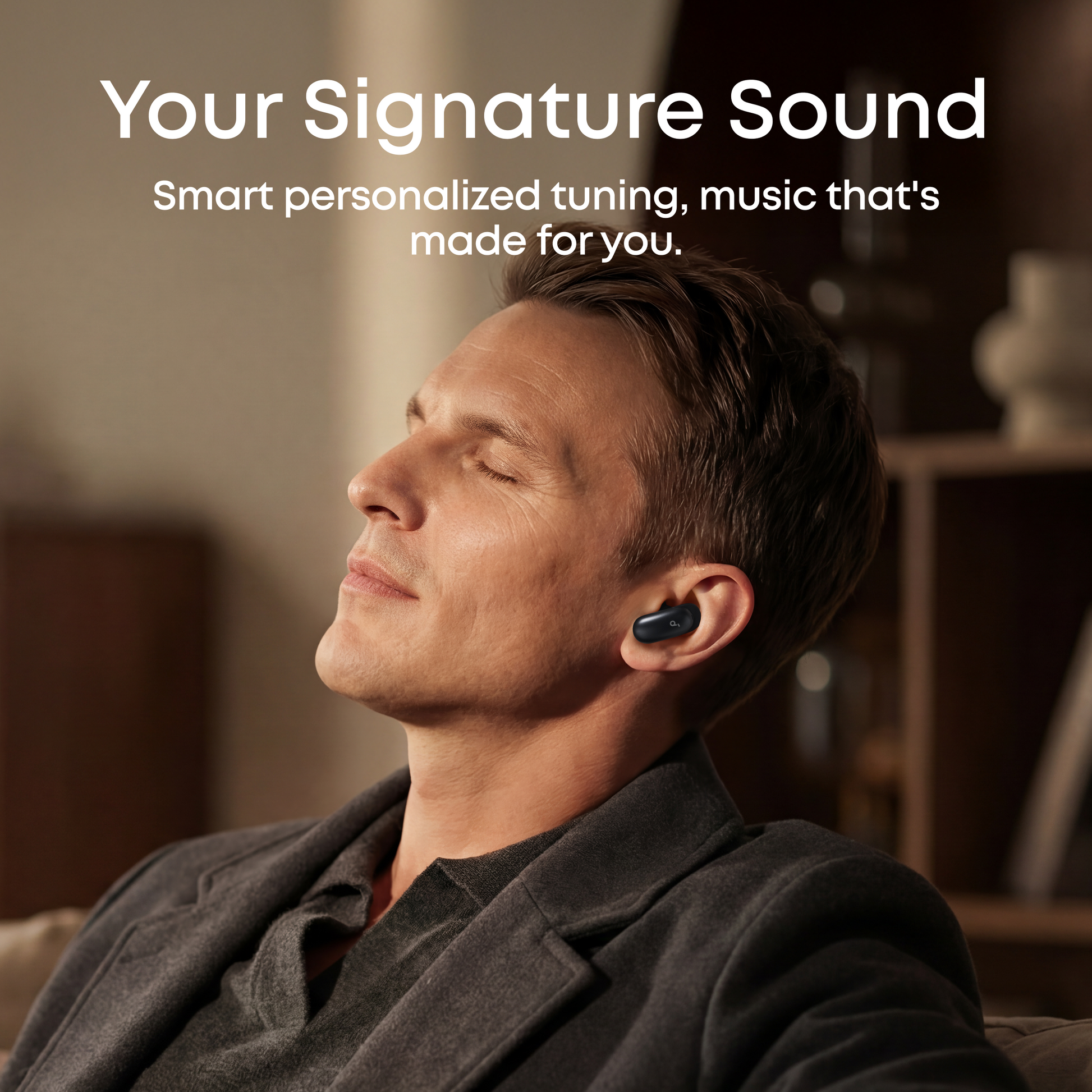 Man wearing soundcore Liberty 5 Pro ANC earbuds enjoying smart personalized sound tuning for a custom music experience