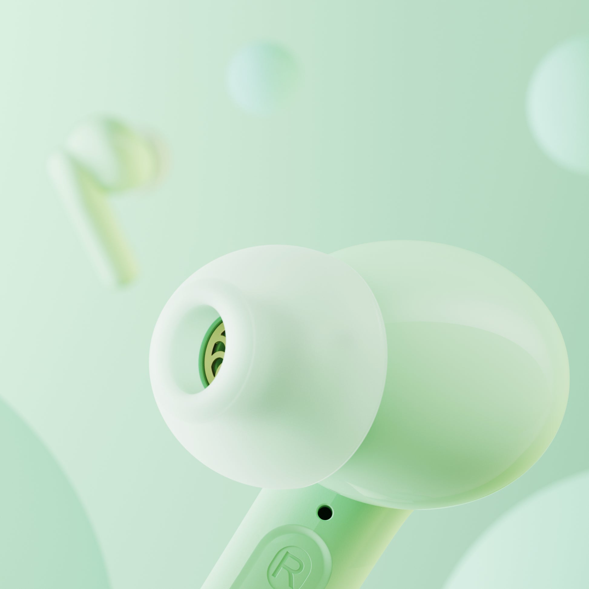 soundcore mint green earbud with earbuds grill