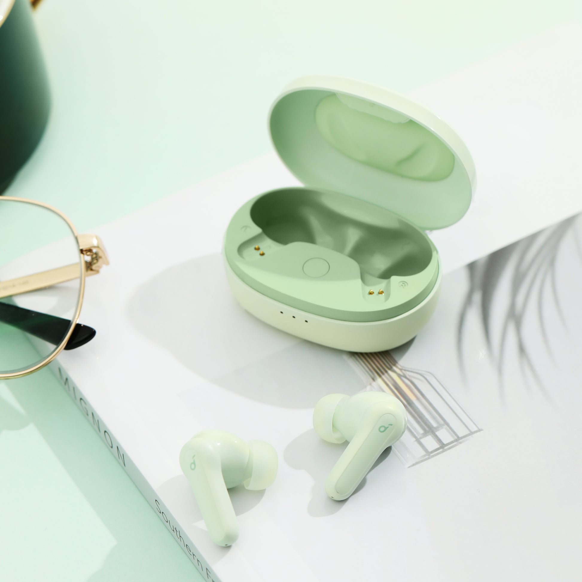 soundcore wireless earbuds with charging case in mint green