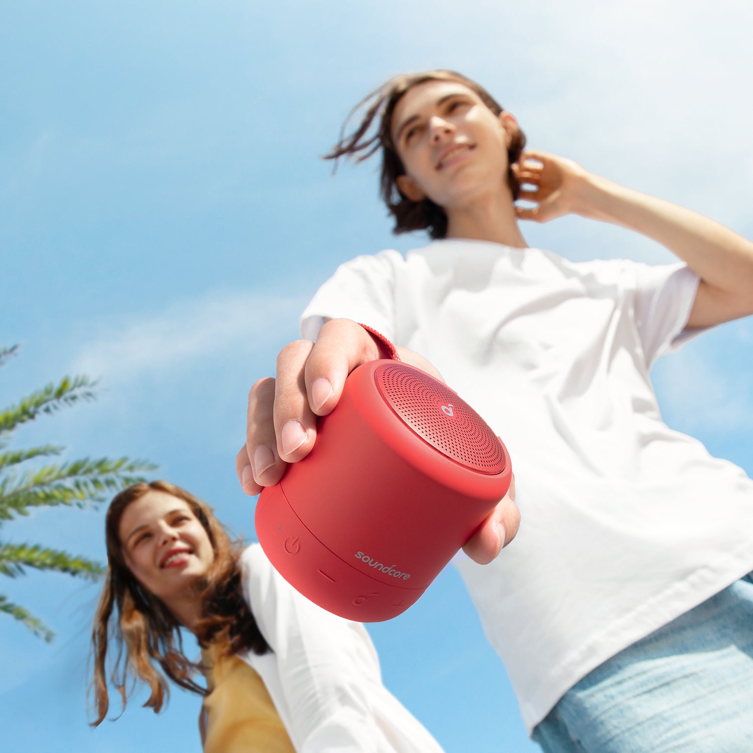 soundcore red speaker with portable design outdoors